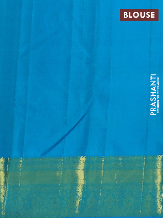 Pure kanchipuram silk saree light green and teal blue with zari woven buttas and zari woven border