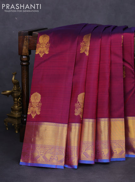 Pure kanchipuram silk saree dual shade of maroon and cs blue with zari woven floral buttas and zari woven border