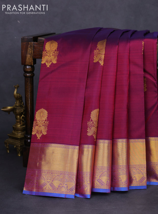 Pure kanchipuram silk saree dual shade of maroon and cs blue with zari woven floral buttas and zari woven border