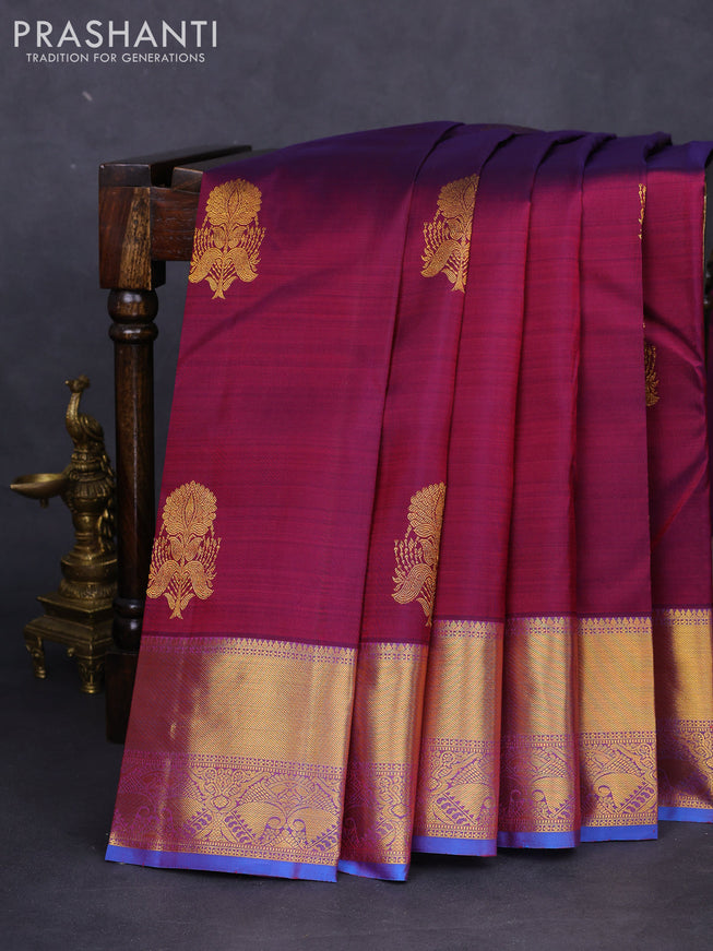 Pure kanchipuram silk saree dual shade of maroon and cs blue with zari woven floral buttas and zari woven border