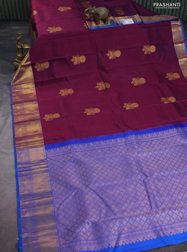 Pure kanchipuram silk saree dual shade of maroon and cs blue with zari woven floral buttas and zari woven border