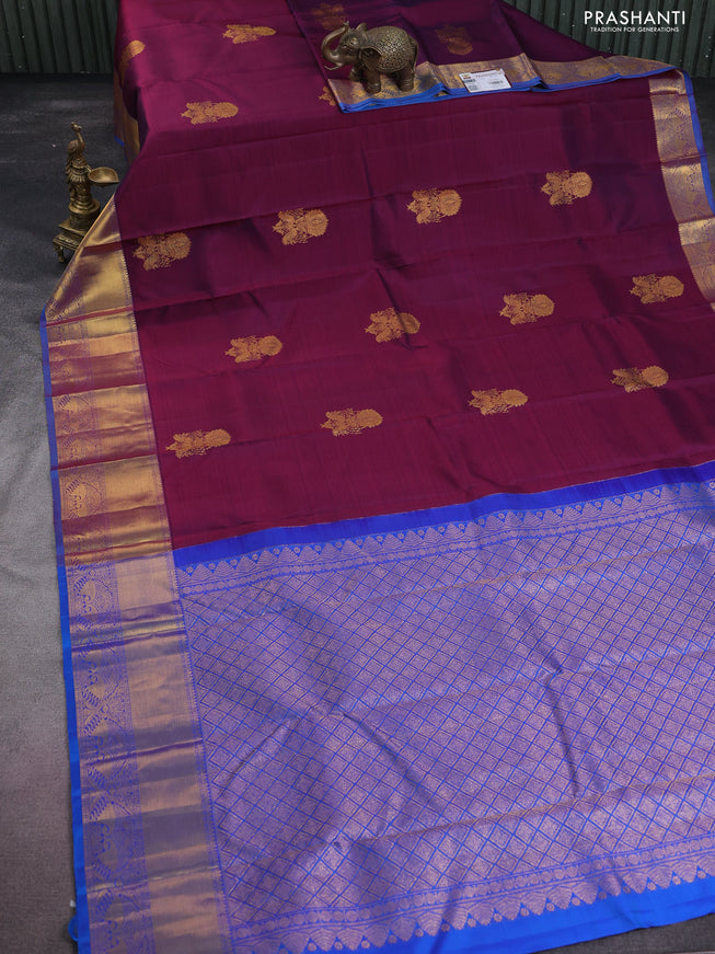 Pure kanchipuram silk saree dual shade of maroon and cs blue with zari woven floral buttas and zari woven border