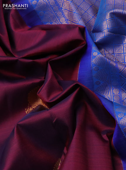 Pure kanchipuram silk saree dual shade of maroon and cs blue with zari woven floral buttas and zari woven border