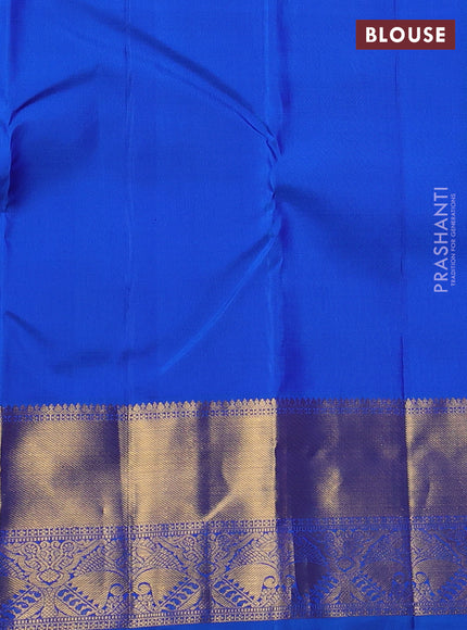 Pure kanchipuram silk saree dual shade of maroon and cs blue with zari woven floral buttas and zari woven border
