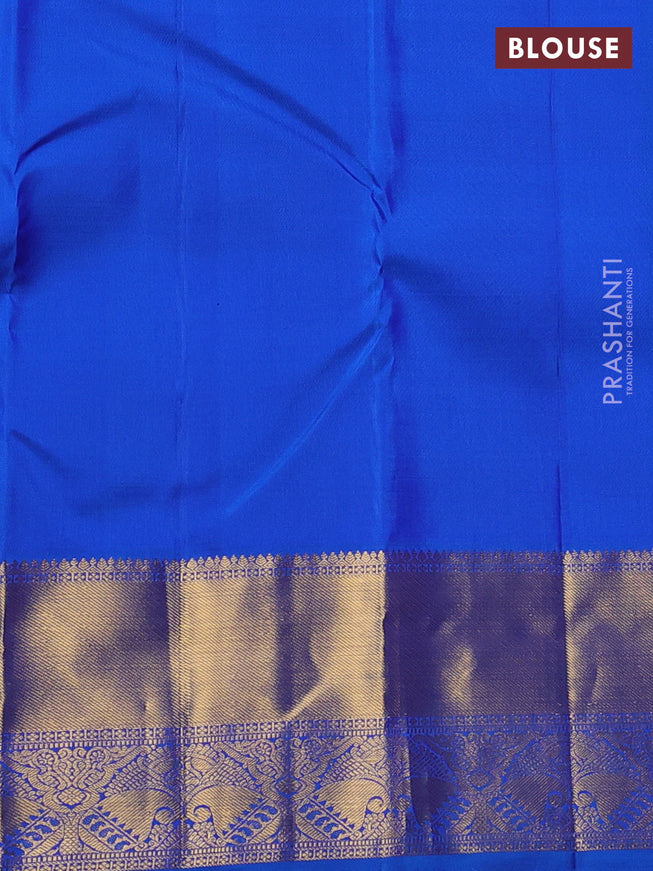Pure kanchipuram silk saree dual shade of maroon and cs blue with zari woven floral buttas and zari woven border