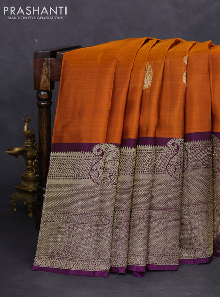 Pure kanchipuram silk saree mustard shade and deep violet with paisley zari woven buttas and long zari woven border