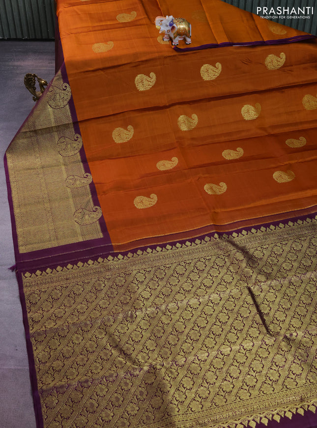 Pure kanchipuram silk saree mustard shade and deep violet with paisley zari woven buttas and long zari woven border