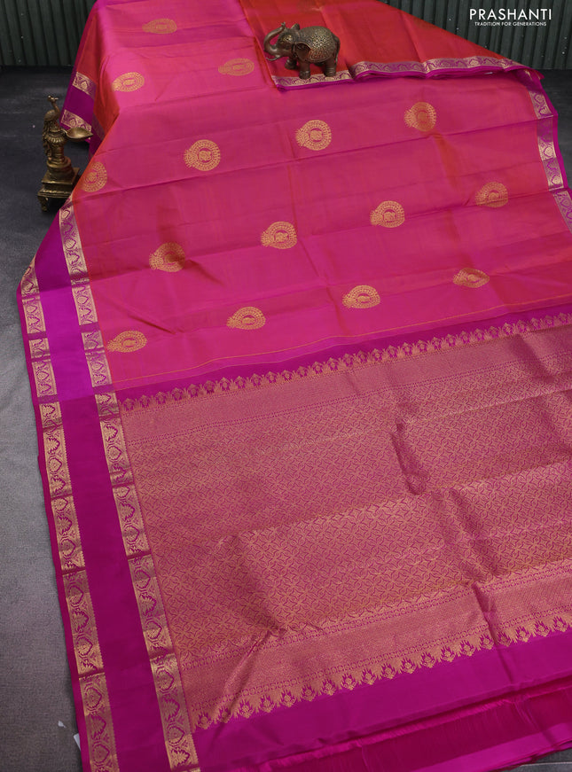 Pure kanchipuram silk saree dual shade of pinkish orange and pink with zari woven buttas and rettapet zari woven border