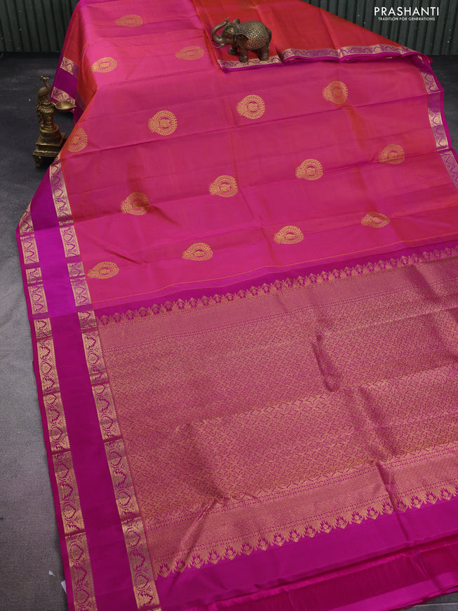 Pure kanchipuram silk saree dual shade of pinkish orange and pink with zari woven buttas and rettapet zari woven border