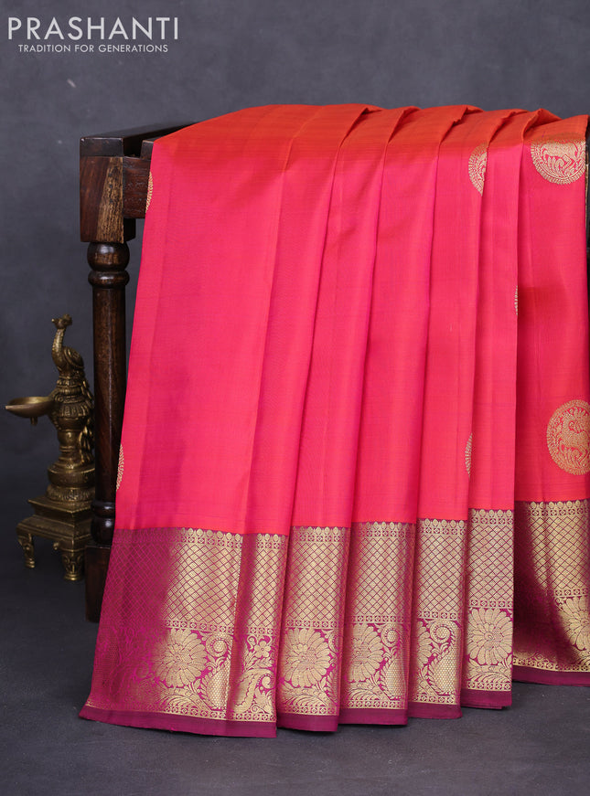 Pure kanchipuram silk saree dual shade of pinkish orange and magenta pink with zari woven buttas and zari woven border
