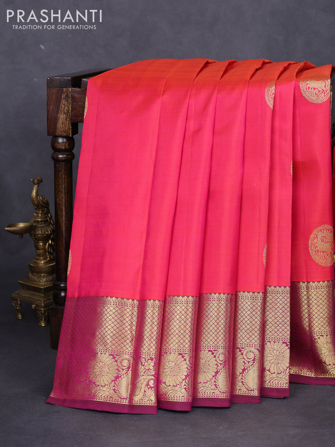 Pure kanchipuram silk saree dual shade of pinkish orange and magenta pink with zari woven buttas and zari woven border