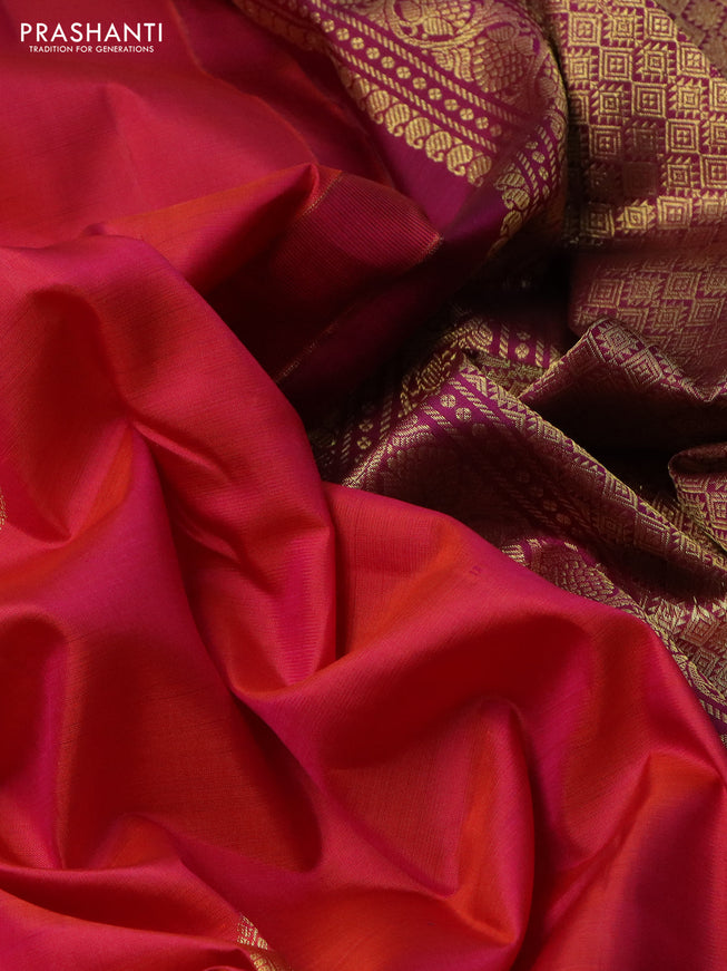 Pure kanchipuram silk saree dual shade of pinkish orange and magenta pink with zari woven buttas and zari woven border