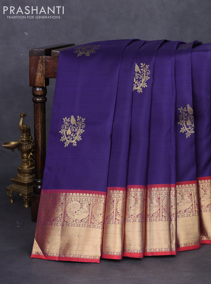 Pure kanchipuram silk saree blue and dual shade of pinkish orange with zari woven buttas and zari woven border