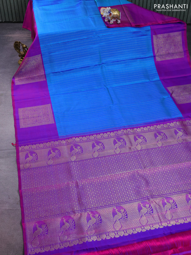 Pure kanchipuram silk saree cs blue and purple with allover zari weaves and zari woven box type butta border
