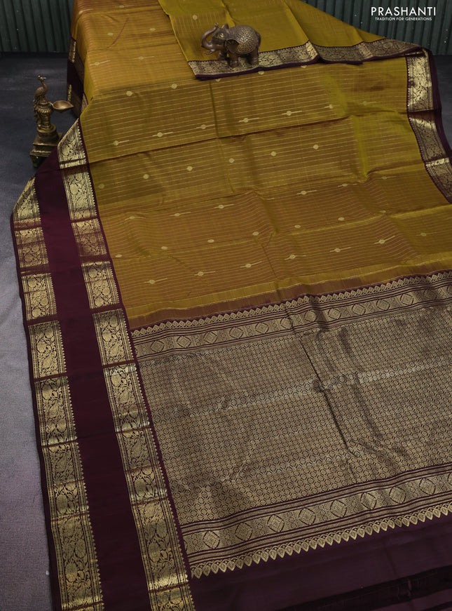 Pure kanchipuram silk saree mehendi green and deep maroon with allover zari weaves & buttas and rettapet zari woven border