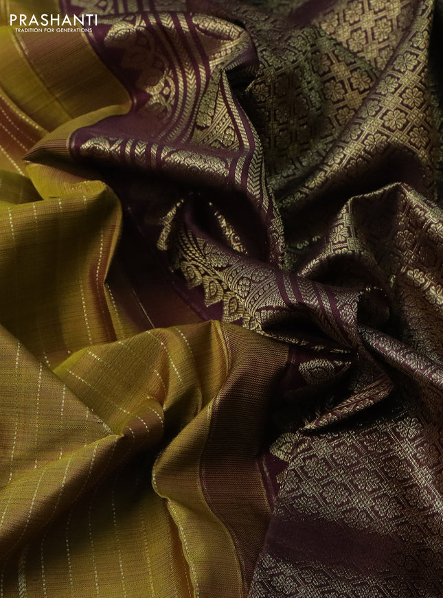 Pure kanchipuram silk saree mehendi green and deep maroon with allover zari weaves & buttas and rettapet zari woven border