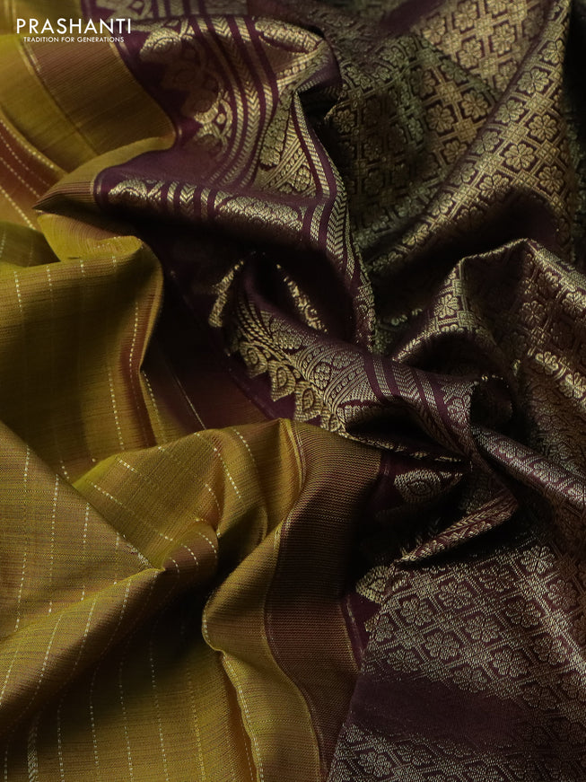 Pure kanchipuram silk saree mehendi green and deep maroon with allover zari weaves & buttas and rettapet zari woven border