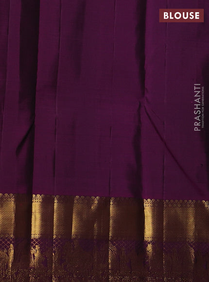 Pure kanchipuram silk saree green and purple with zari woven buttas and zari woven border