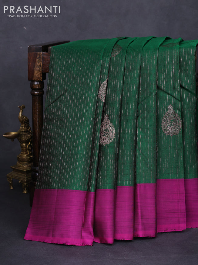 Pure kanchipuram silk saree green and magenta pink with allover zari weaves and simple border
