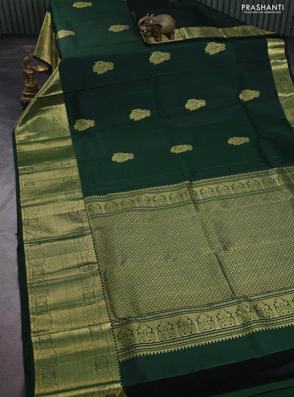 Pure kanchipuram silk saree dark green with zari woven buttas and zari woven border