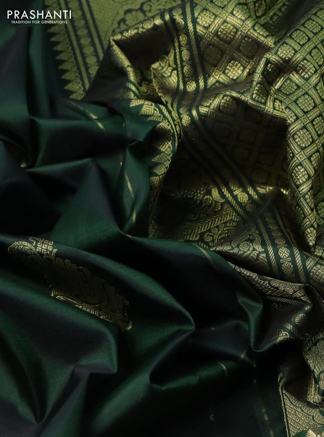 Pure kanchipuram silk saree dark green with zari woven buttas and zari woven border