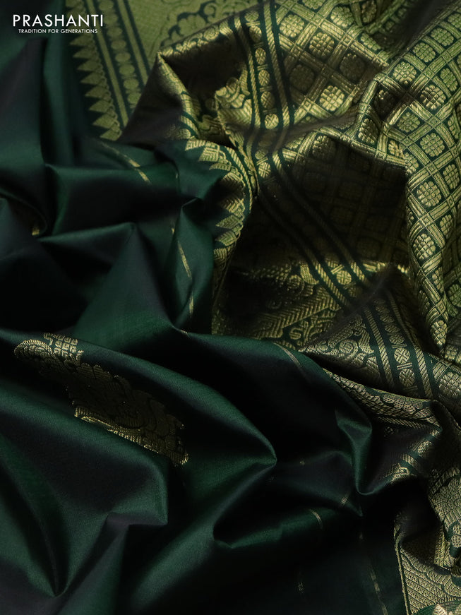 Pure kanchipuram silk saree dark green with zari woven buttas and zari woven border