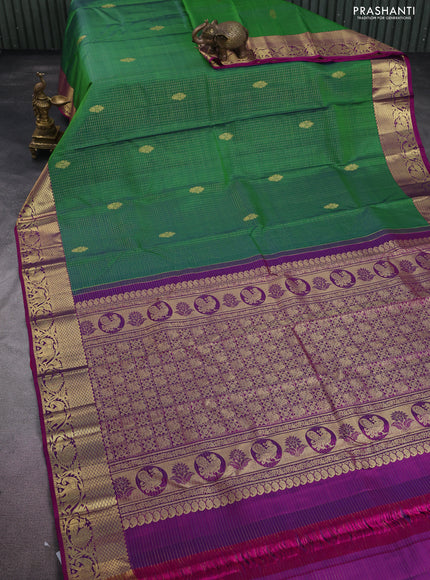 Pure kanchipuram silk saree green and purple with allover small zari checks & buttas and zari woven border