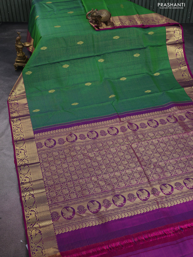 Pure kanchipuram silk saree green and purple with allover small zari checks & buttas and zari woven border
