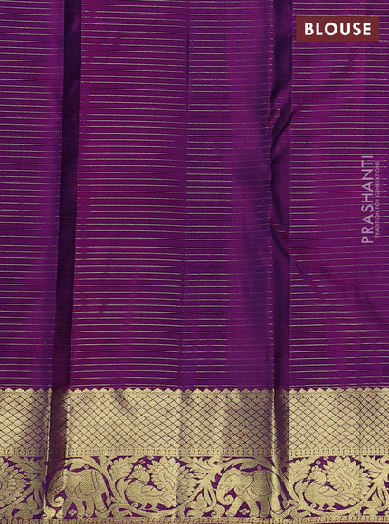 Pure kanchipuram silk saree green and purple with allover small zari checks & buttas and zari woven border