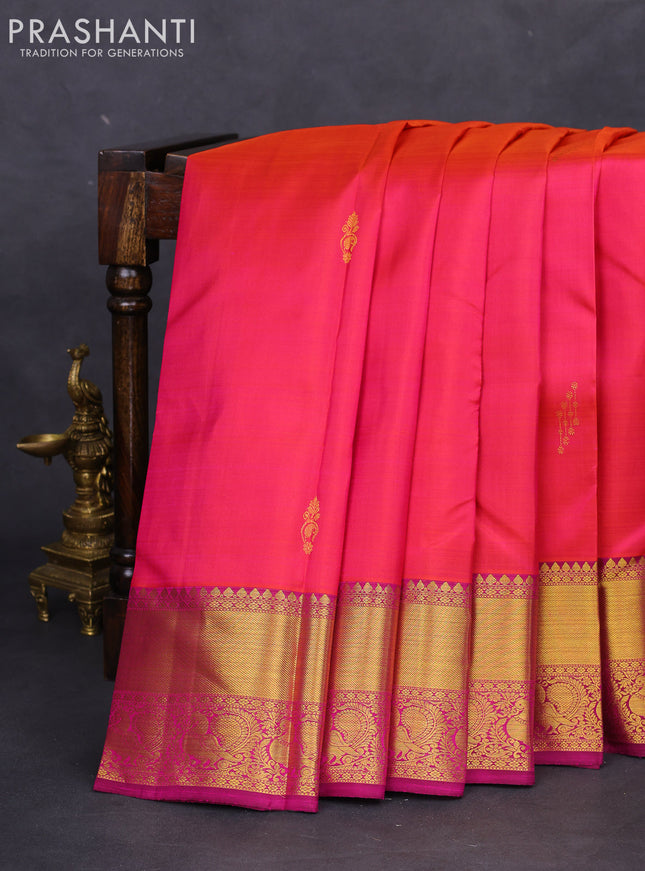 Pure kanchipuram silk saree dual shade of pinkish orange and purple with zari woven buttas and annam zari woven border