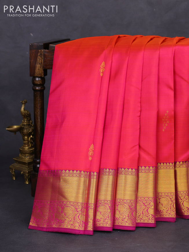 Pure kanchipuram silk saree dual shade of pinkish orange and purple with zari woven buttas and annam zari woven border