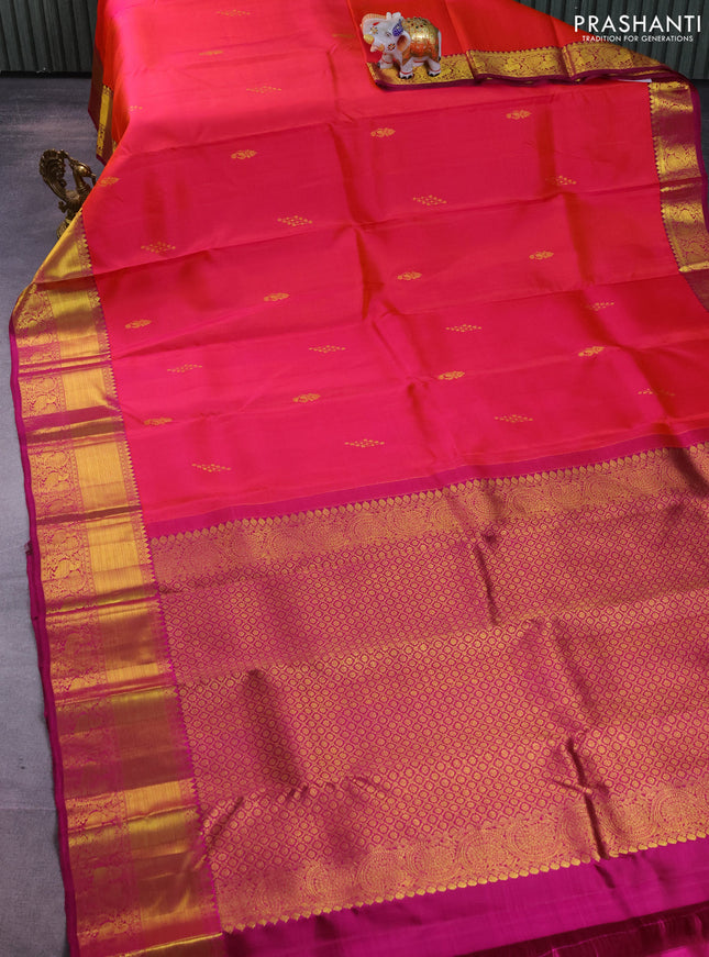 Pure kanchipuram silk saree dual shade of pinkish orange and purple with zari woven buttas and annam zari woven border