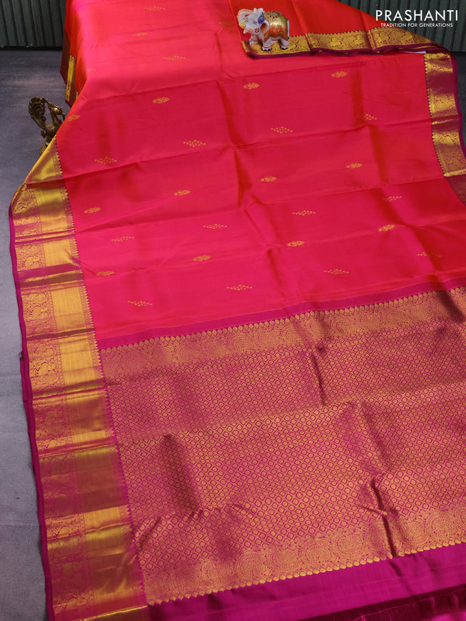Pure kanchipuram silk saree dual shade of pinkish orange and purple with zari woven buttas and annam zari woven border