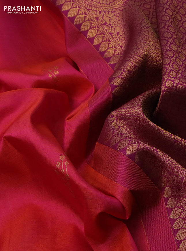 Pure kanchipuram silk saree dual shade of pinkish orange and purple with zari woven buttas and annam zari woven border