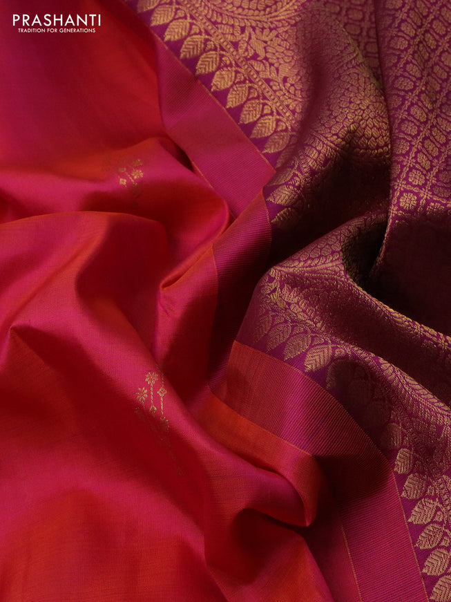 Pure kanchipuram silk saree dual shade of pinkish orange and purple with zari woven buttas and annam zari woven border