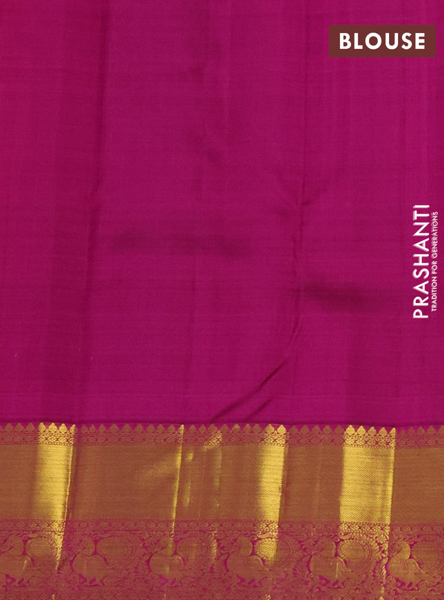 Pure kanchipuram silk saree dual shade of pinkish orange and purple with zari woven buttas and annam zari woven border