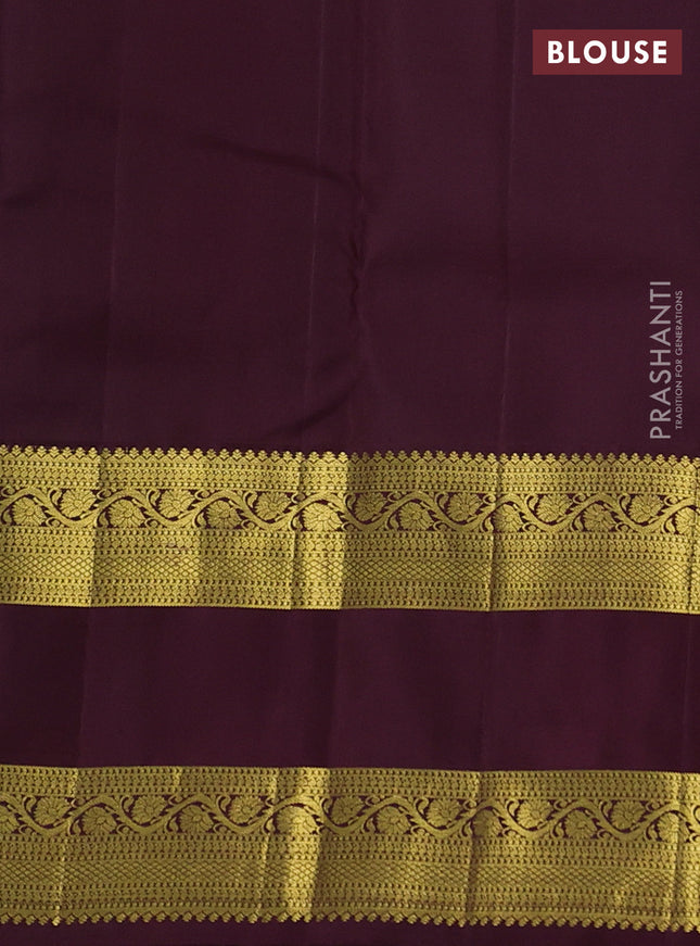 Pure kanchipuram silk saree peacock green and deep maroon with zari woven buttas and rettapet zari woven border