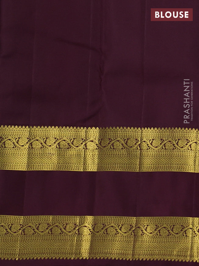 Pure kanchipuram silk saree peacock green and deep maroon with zari woven buttas and rettapet zari woven border