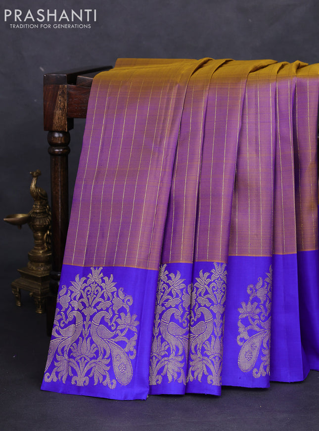 Pure kanchipuram silk saree dual shade of green and royal blue with allover zari weaves and zari woven butta border