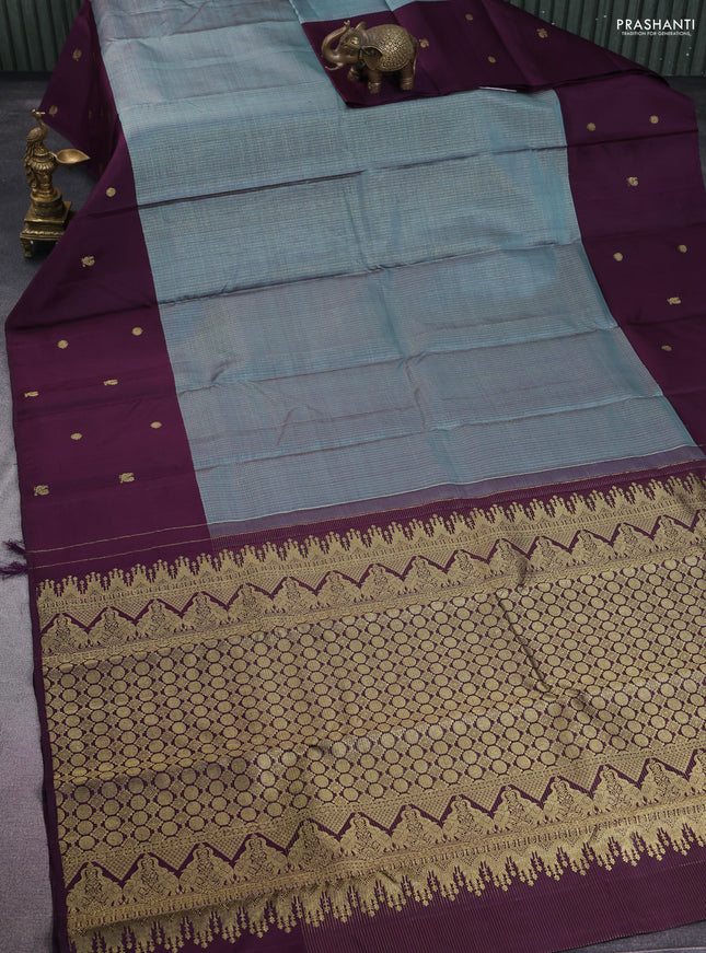 Pure kanchipuram silk saree teal shade and deep jamun with allover small zari checks and zari woven butta border