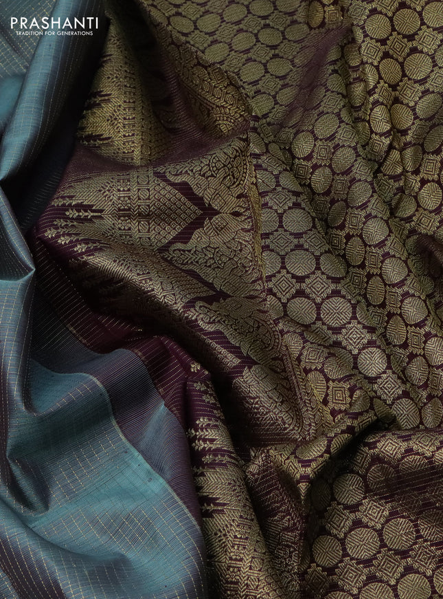 Pure kanchipuram silk saree teal shade and deep jamun with allover small zari checks and zari woven butta border