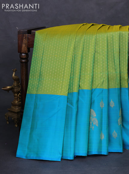 Pure kanchipuram silk saree light green and teal blue with allover zari weaves and zari woven butta border