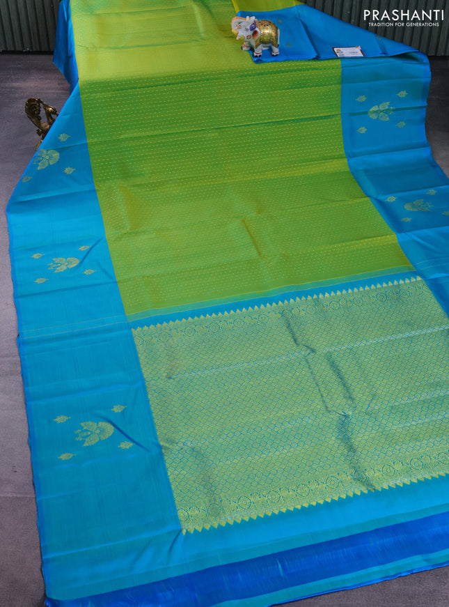 Pure kanchipuram silk saree light green and teal blue with allover zari weaves and zari woven butta border
