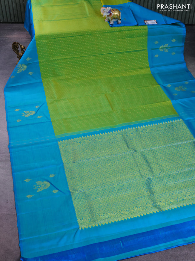 Pure kanchipuram silk saree light green and teal blue with allover zari weaves and zari woven butta border