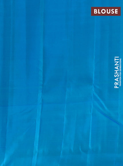 Pure kanchipuram silk saree light green and teal blue with allover zari weaves and zari woven butta border