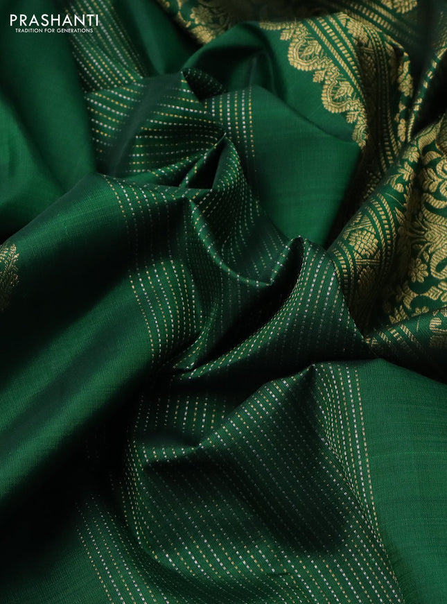Pure kanchipuram silk saree green with allover silver gold zari weaves & paisley buttas in borderless style