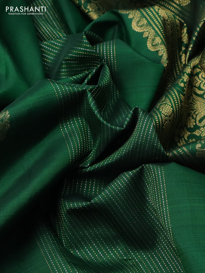 Pure kanchipuram silk saree green with allover silver gold zari weaves & paisley buttas in borderless style