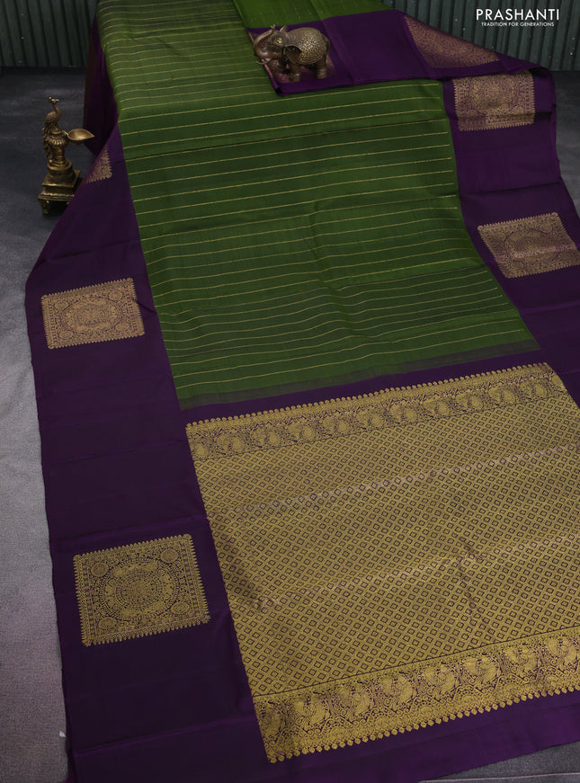 Pure kanchipuram silk saree mehendi green and deep violet with allover zari stripes pattern and zari woven box type butta border