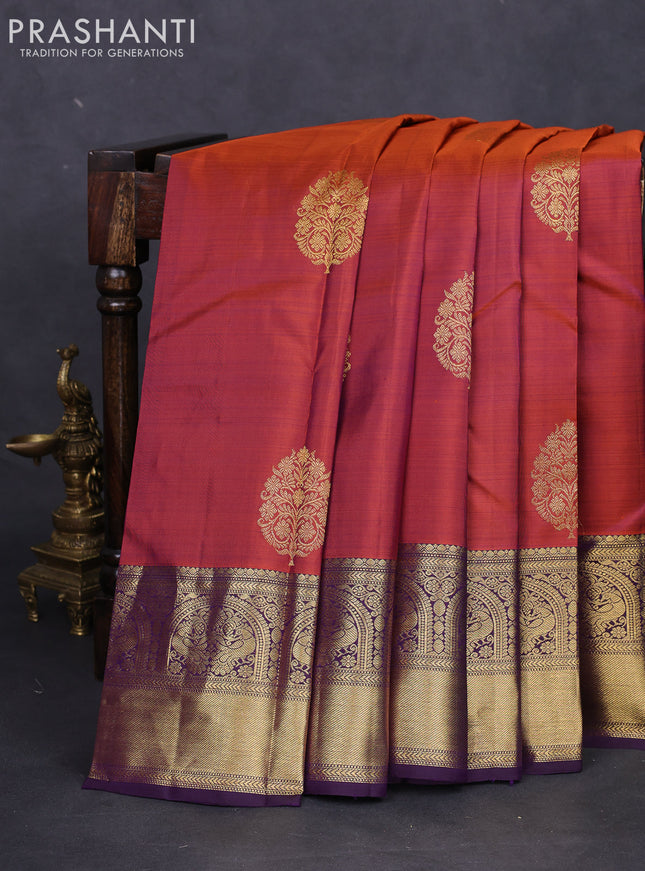 Pure kanchipuram silk saree dual shade of rust and deep violet with zari woven buttas and zari woven border