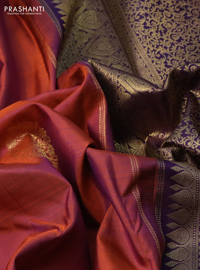 Pure kanchipuram silk saree dual shade of rust and deep violet with zari woven buttas and zari woven border